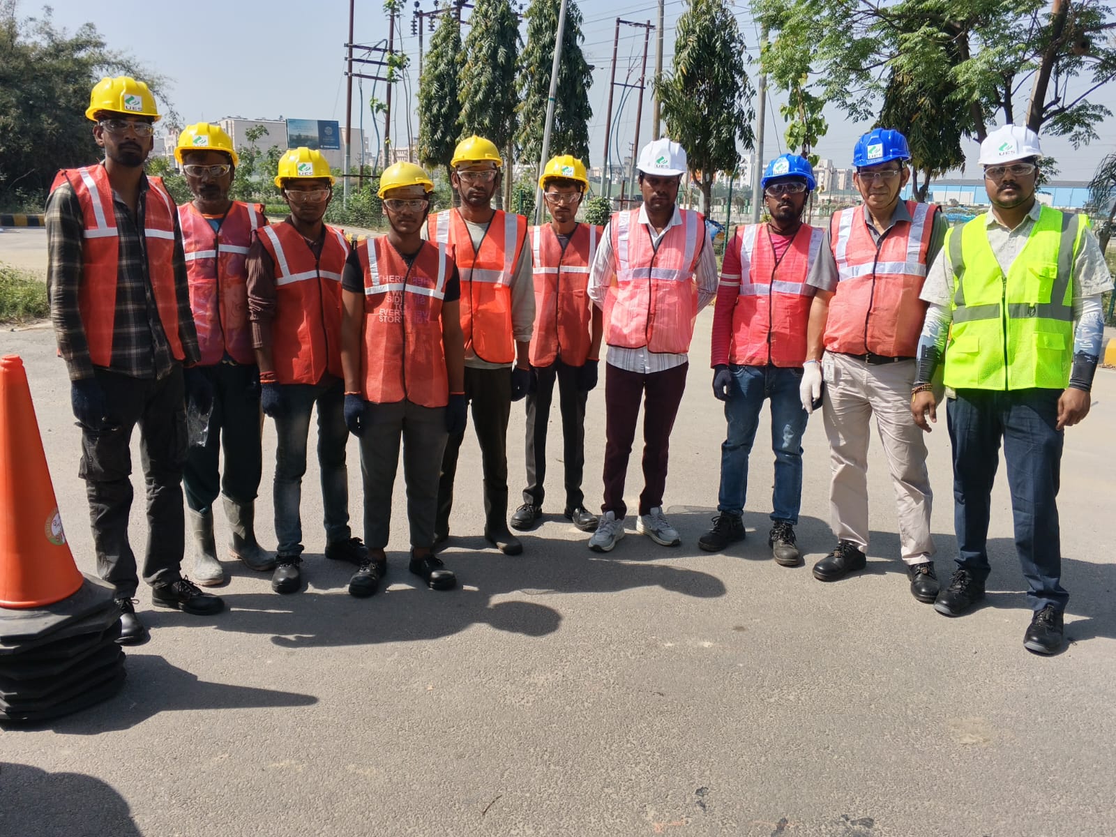 Engineers reviewing pipeline installation plans on site